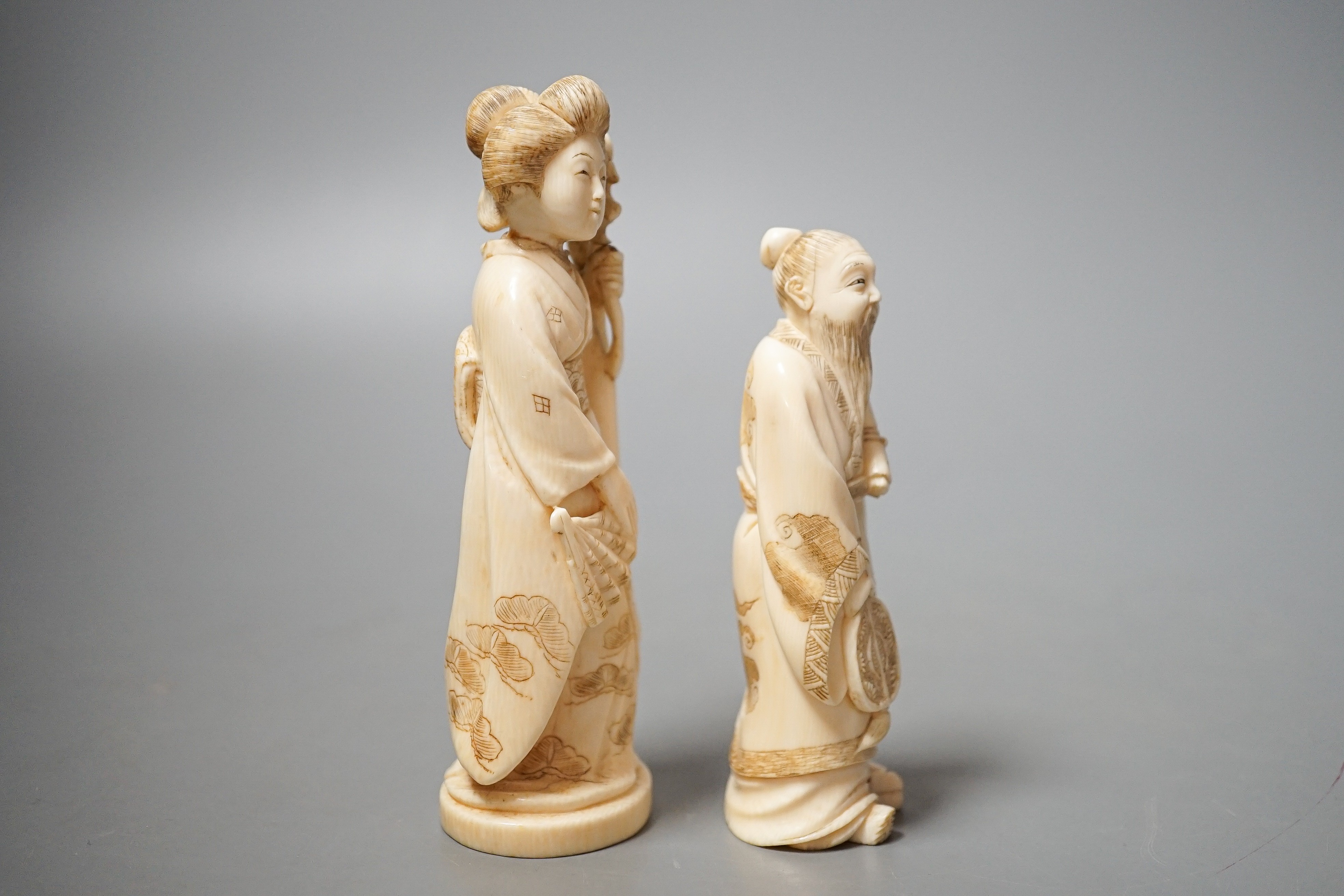 Two Japanese ivory figures of a bijin and a sage, early 20th century 12cm
